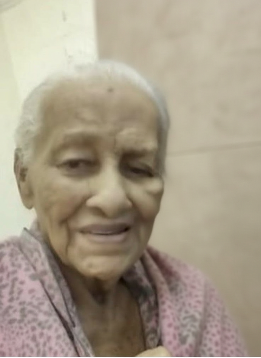 Mamá — Natalie's maternal grandmother who raised her in the Dominican Republic